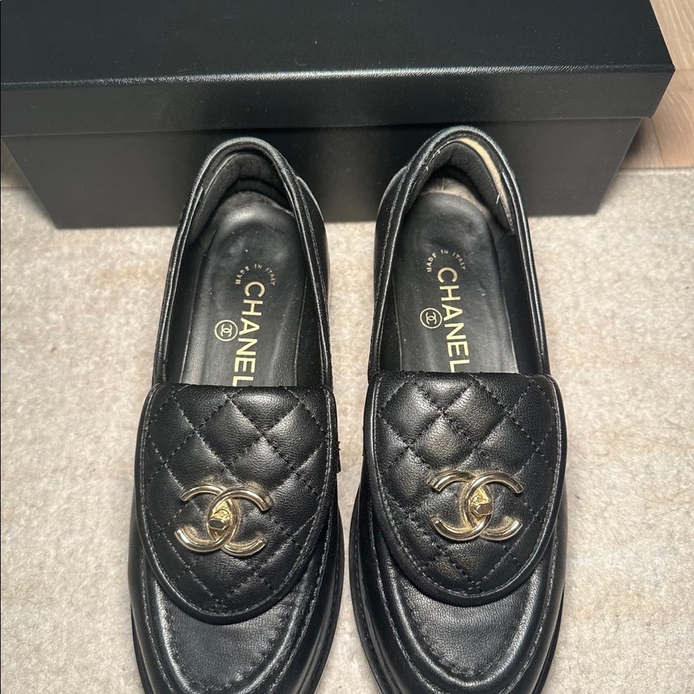 Black Chanel leather loafers size 37.